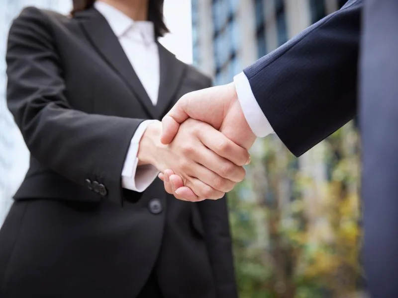 Business handshake when hiring a security company in Las Vegas